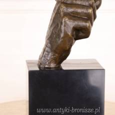 Zamyślona twarz - brąz na marmurze
