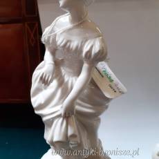 "Elegancka para". 2 figurki z bialej porcelany (monochromia). XIX w. - poz. 5147