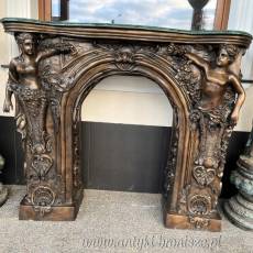 MONUMENTALNY KOMINEK Z BRĄZU postacie portal kominkowy