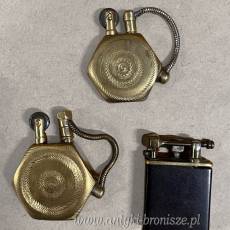 Zestaw trzech polskich zapalniczek okopowych z lat 1920–1940