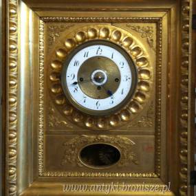 Zegar - obraz w złotej ramie
