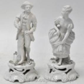 "Elegancka para". 2 figurki z bialej porcelany (monochromia). XIX w. - poz. 5147