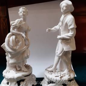 "Elegancka para". 2 figurki z bialej porcelany (monochromia). XIX w. - poz. 5147